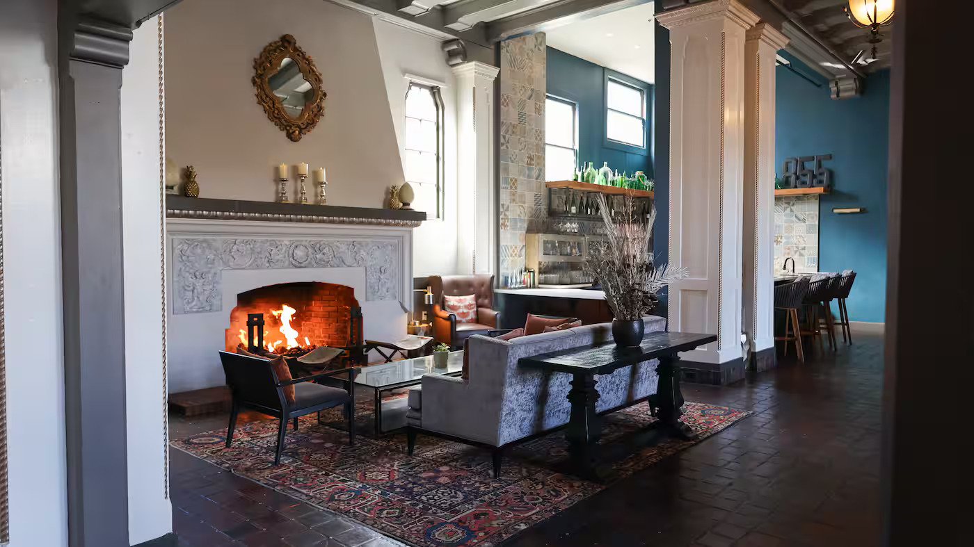 The lobby fireplace seating area at Hotel Petaluma